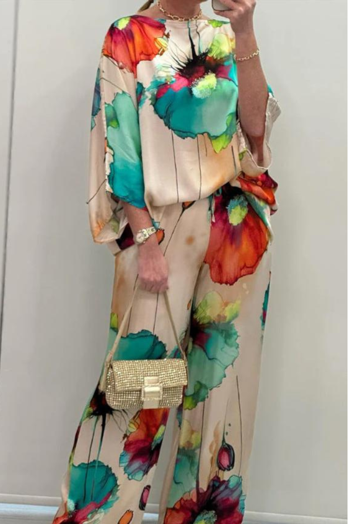 Luxe Damespak met Bloemenprint en Elegante Pasvorm