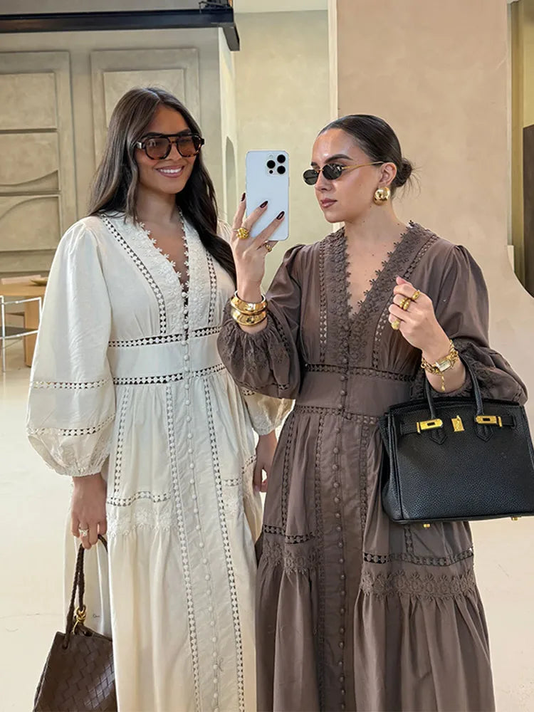 Elegante Damesjurk met V-Hals, Lange Mouwen en Pofdetails