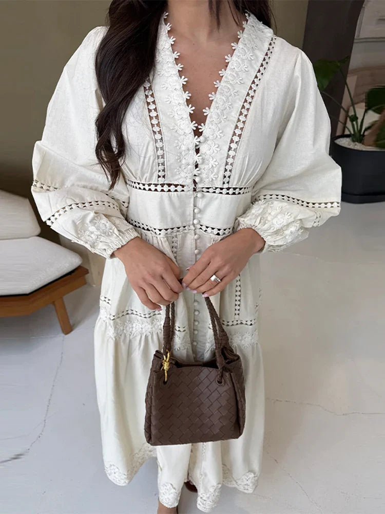 Elegante Damesjurk met V-Hals, Lange Mouwen en Pofdetails